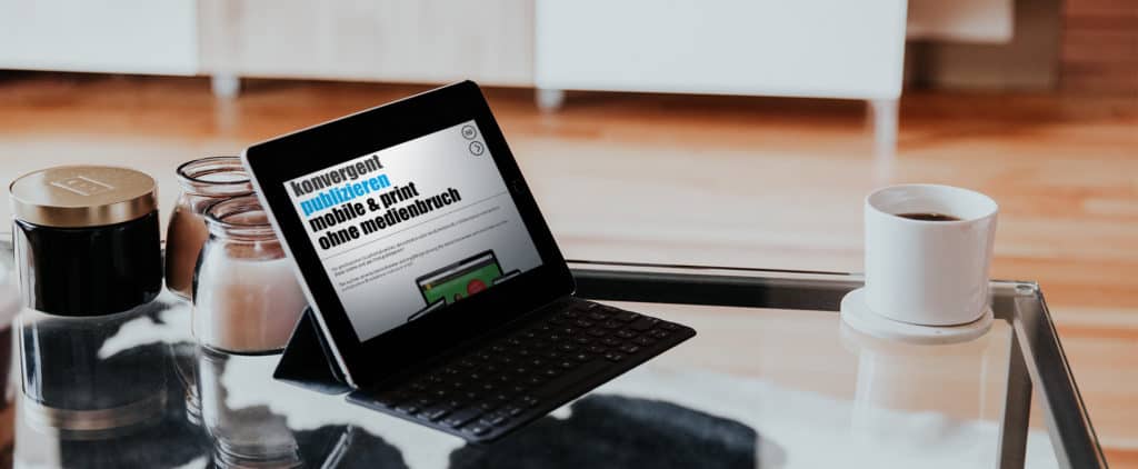 Digitalisierung - Tablet auf Salontisch im Homeoffice -[https://unsplash.com/photos/7UWVcLtrhNk]